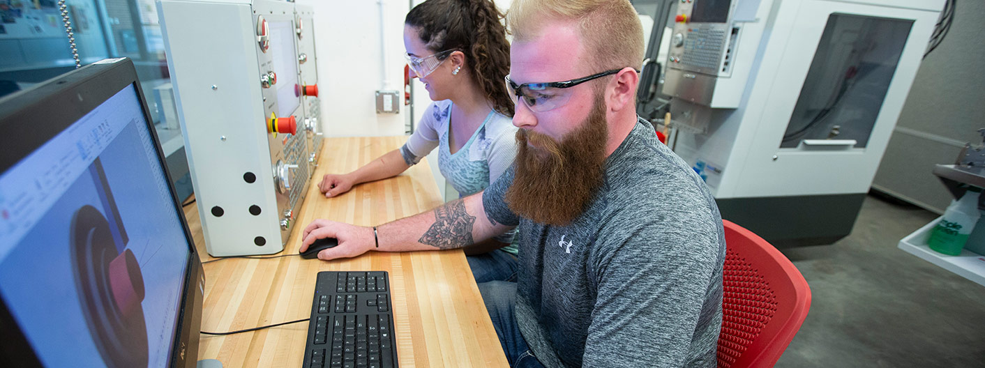 students work in industrial technology laboratory