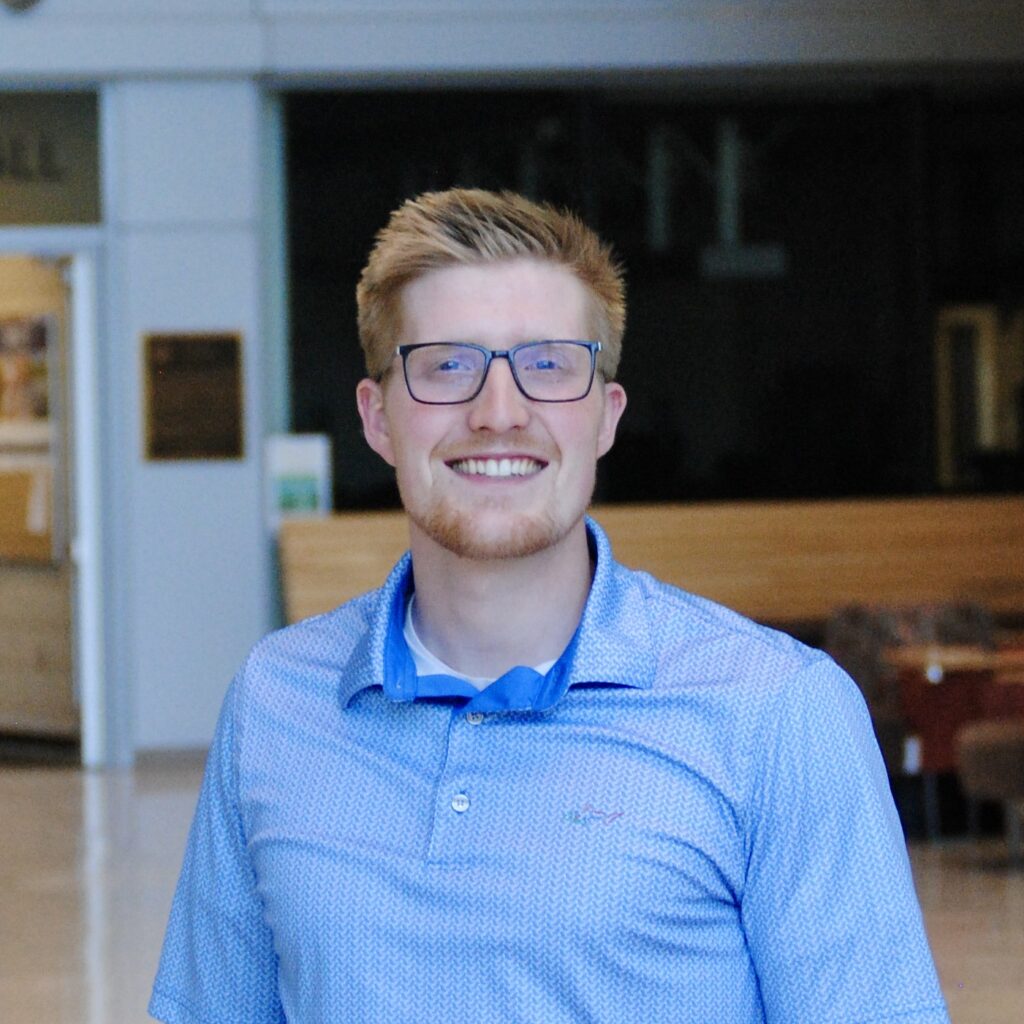 Aaron ABE advisor headshot in Sukup Atrium.